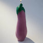 The eggplant candle